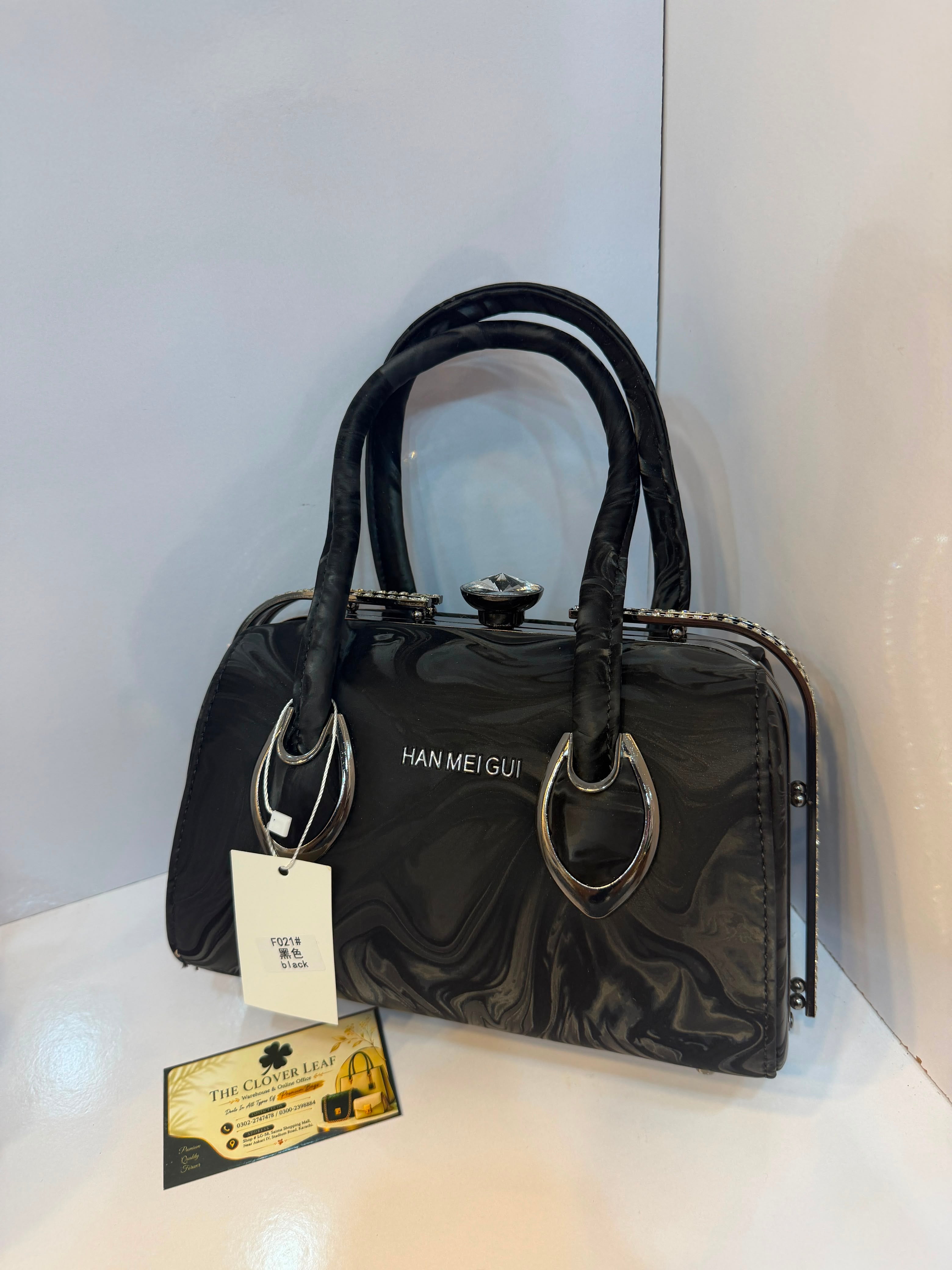 Imported Metallic Frame Handbag