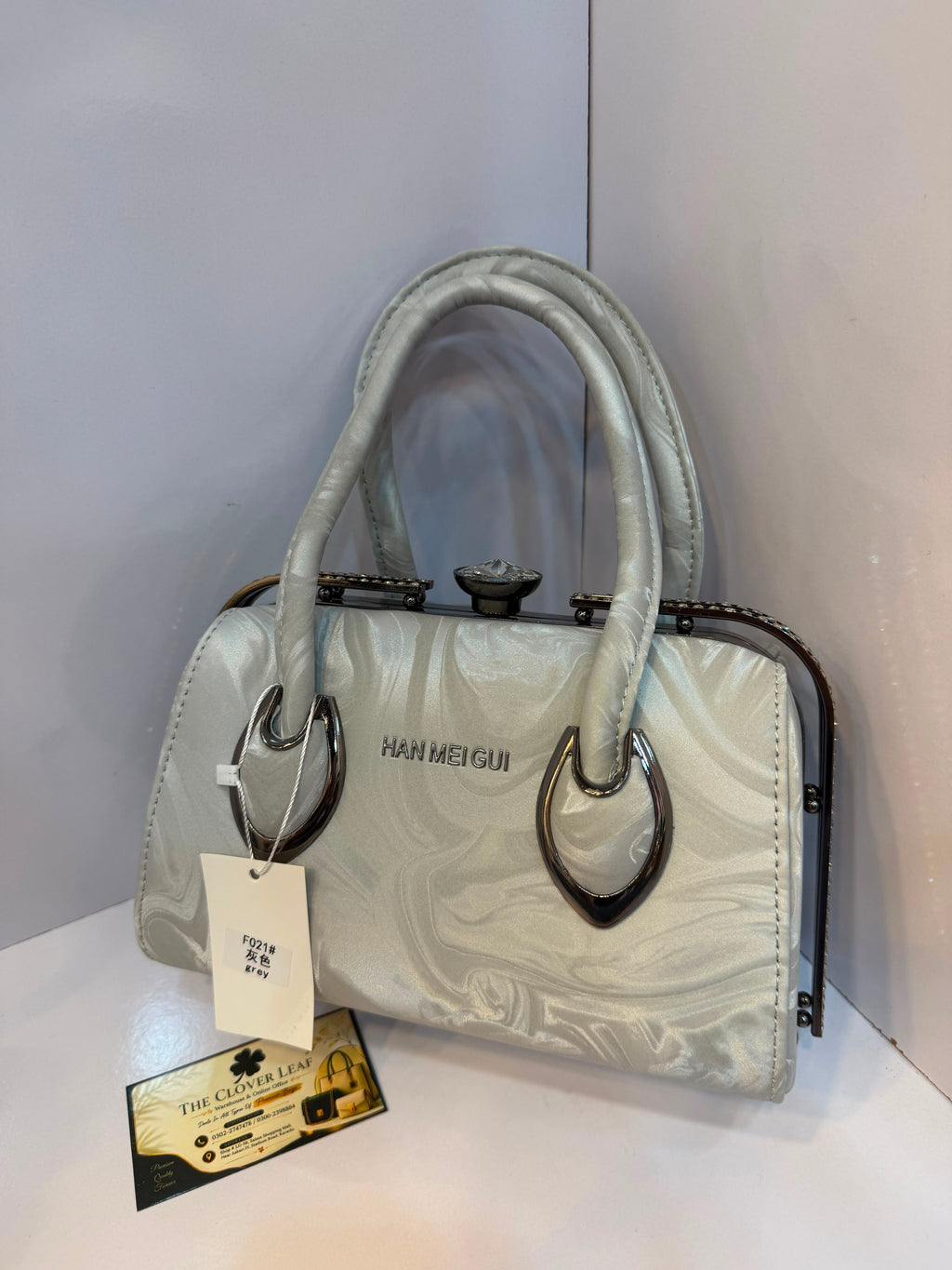 Imported Metallic Frame Handbag