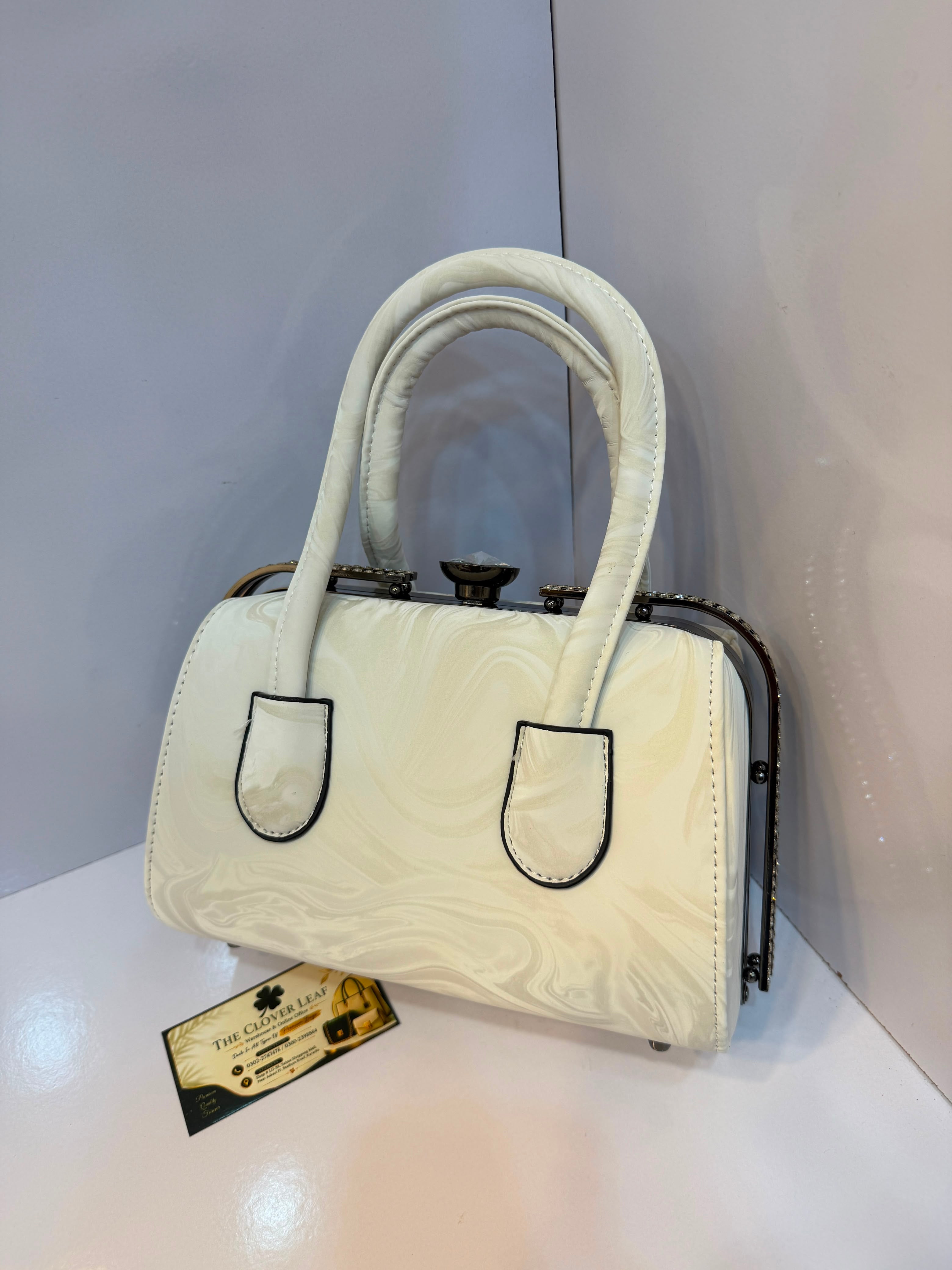 Imported Metallic Frame Handbag