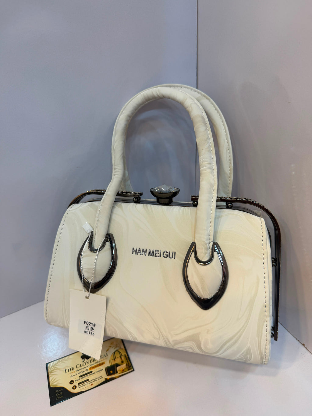 Imported Metallic Frame Handbag