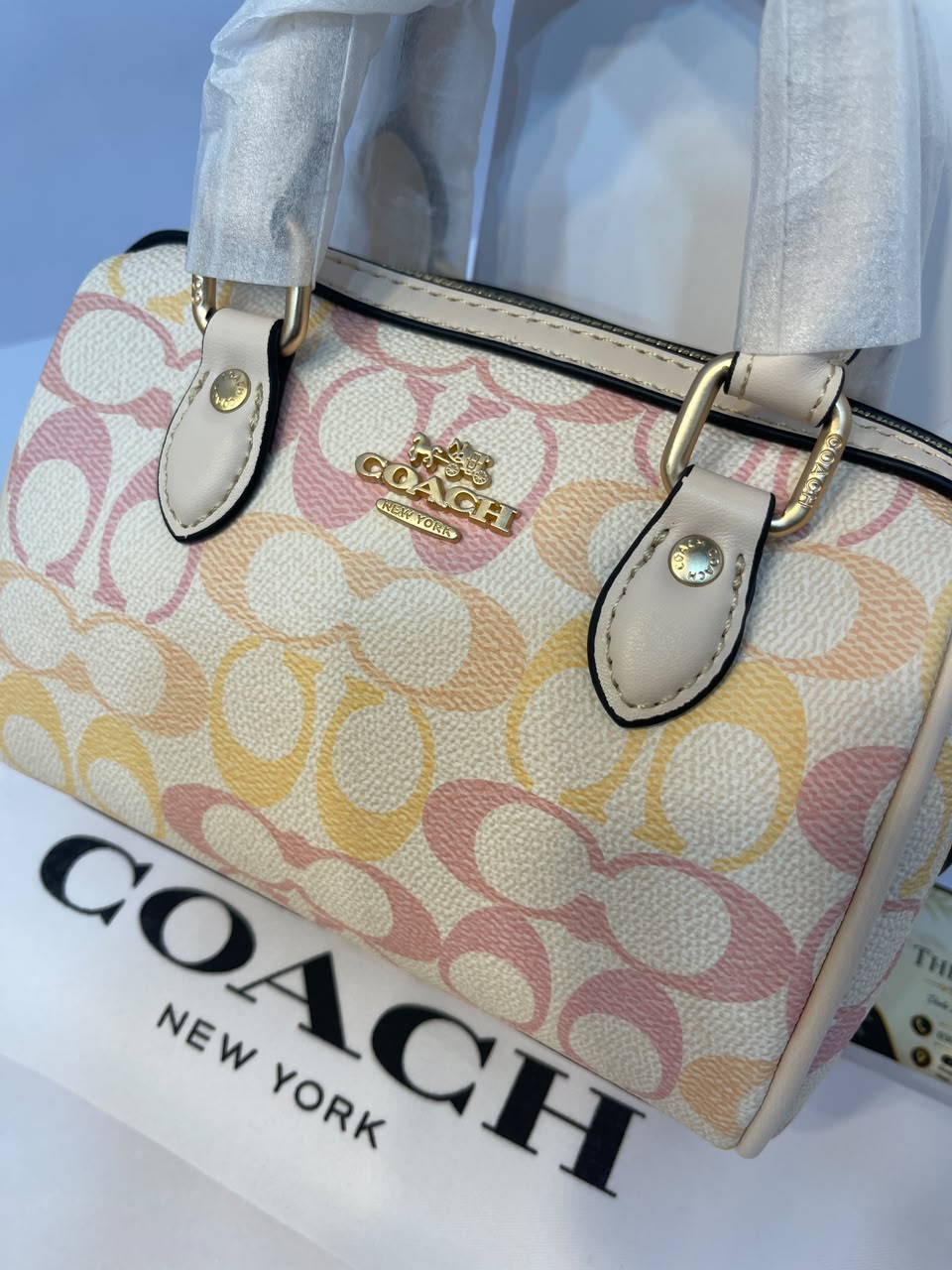Coach Rowan Satchel Bag in Pastel Rainbow Signature Canvas - Luxury Women's Top-Handle Crossbody Bag with Tan Leather Trim (Sand Multi)