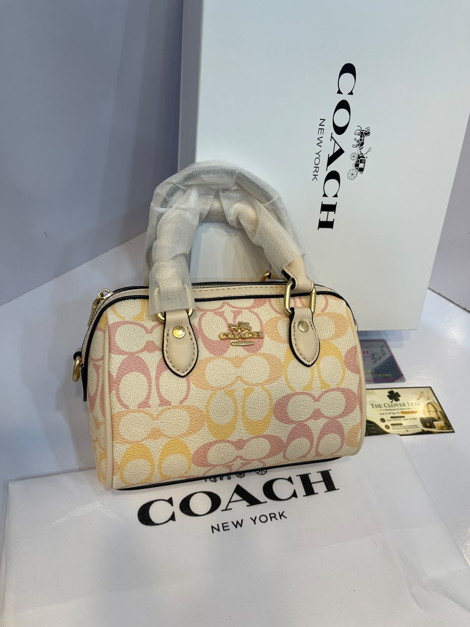 Coach Rowan Satchel Bag in Pastel Rainbow Signature Canvas - Luxury Women's Top-Handle Crossbody Bag with Tan Leather Trim (Sand Multi)