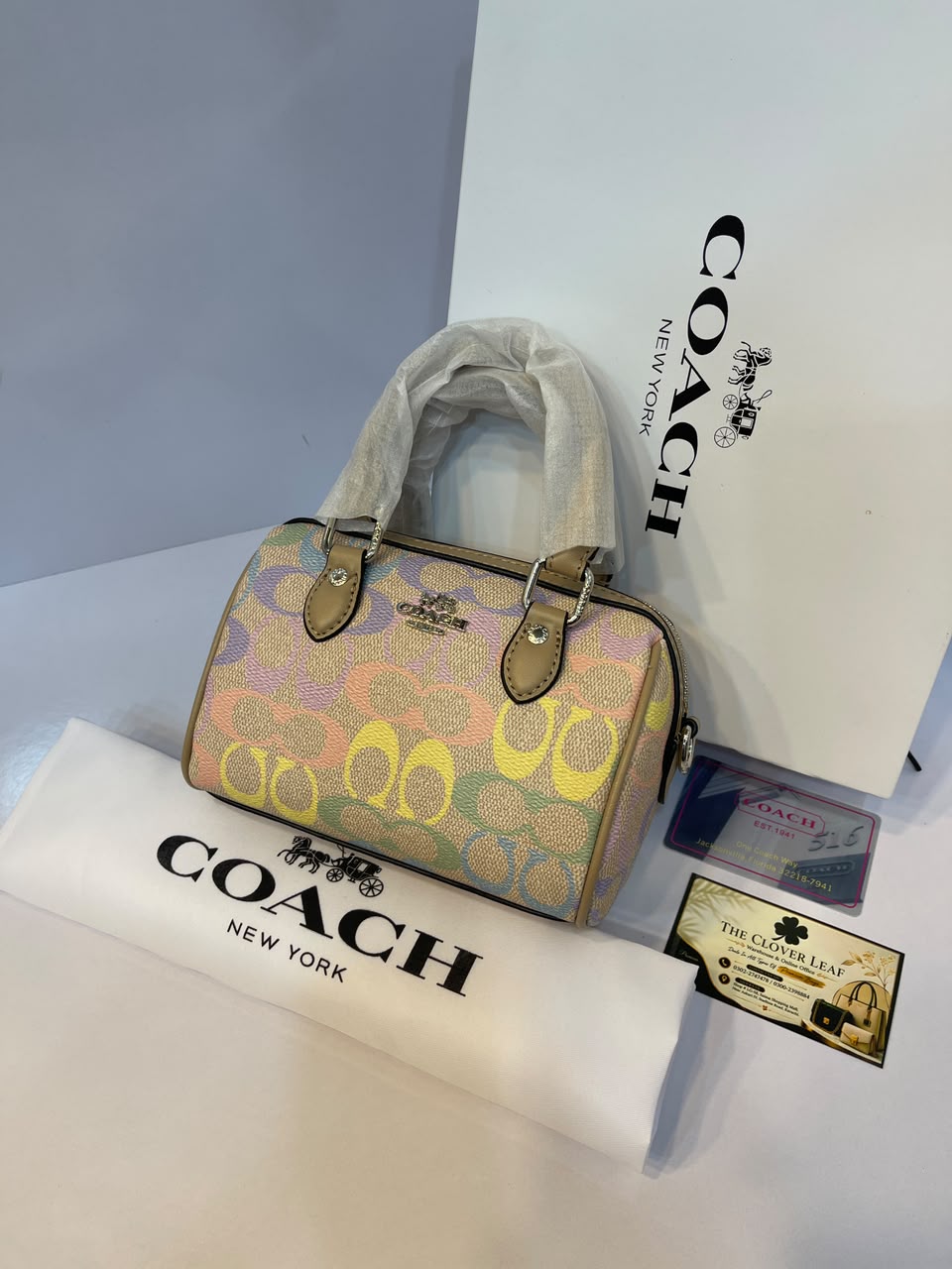 Coach Rowan Satchel Bag in Pastel Rainbow Signature Canvas - Luxury Women's Top-Handle Crossbody Bag with Tan Leather Trim (Sand Multi)