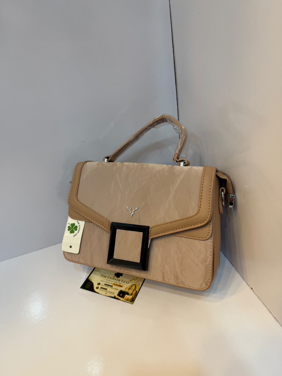 Imported Elegant Crinkled Flap Top-Handle Bag – Luxury Deer Emblem Crossbody Satchel