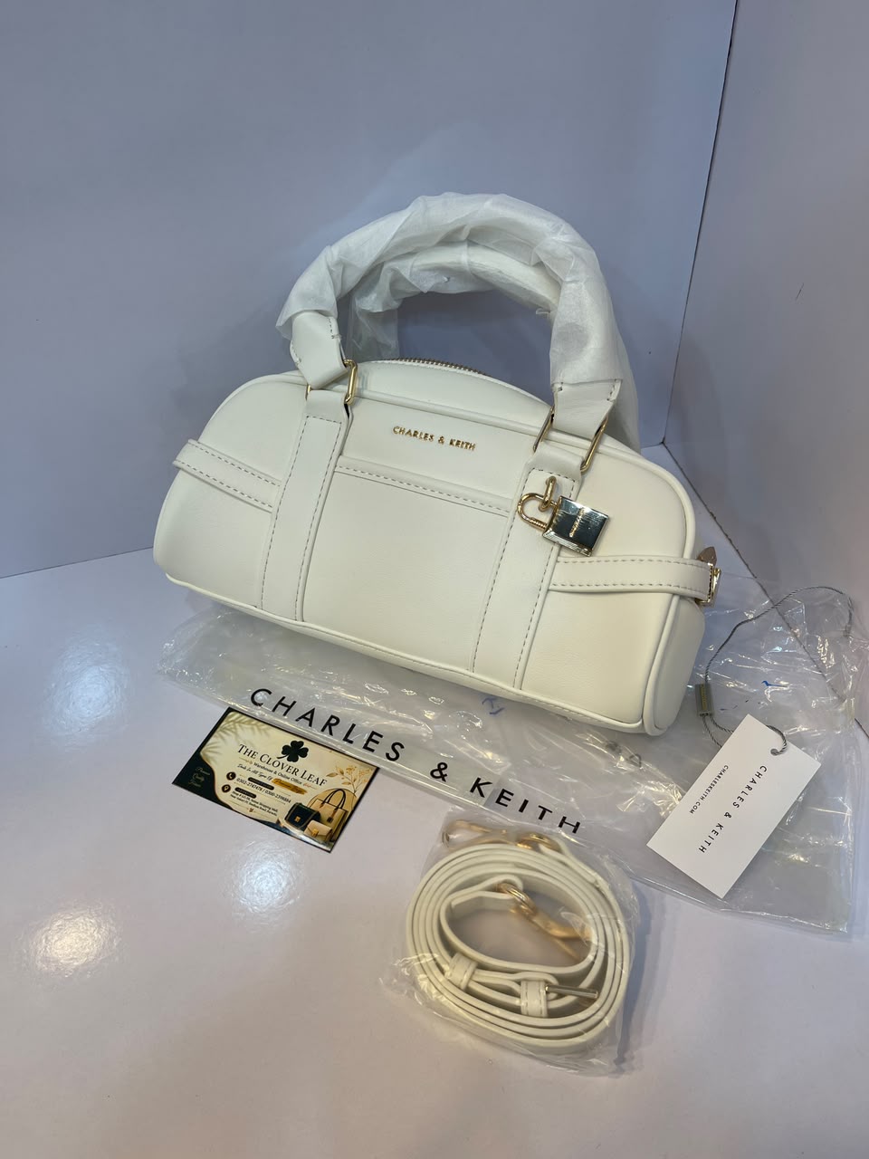 Charles & Keith Canvas Top-Handle Bowling Bag – Elegant Contrast Trim Crossbody Satchel