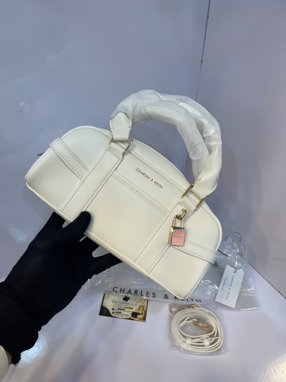 Charles & Keith Canvas Top-Handle Bowling Bag – Elegant Contrast Trim Crossbody Satchel
