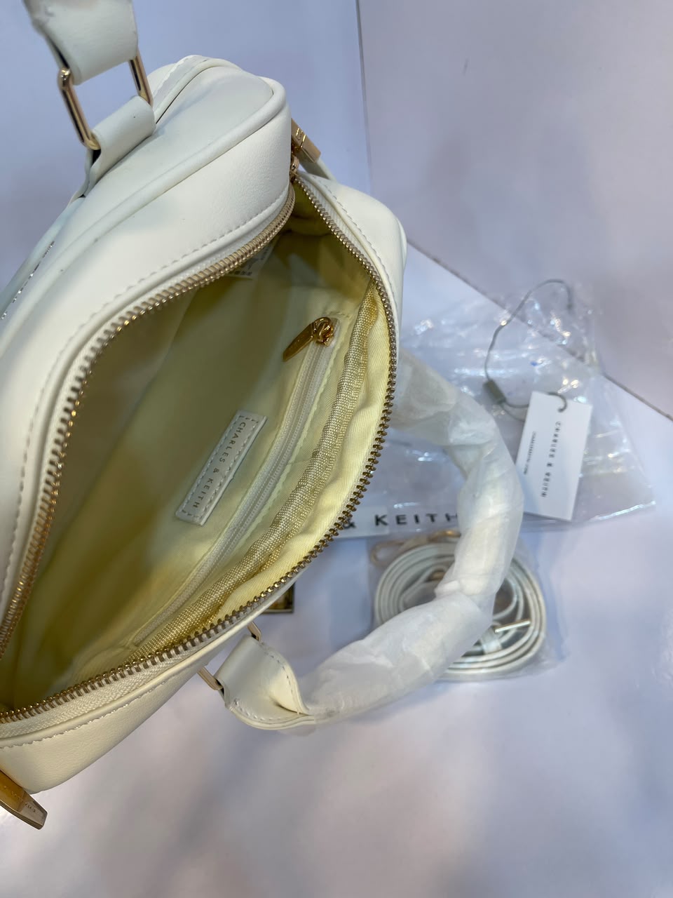 Charles & Keith Canvas Top-Handle Bowling Bag – Elegant Contrast Trim Crossbody Satchel