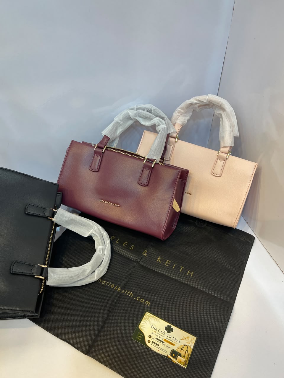 Charles & Keith Minimalist Matte Top-Handle Trapeze Bag – Premium Everyday Crossbody Satchel