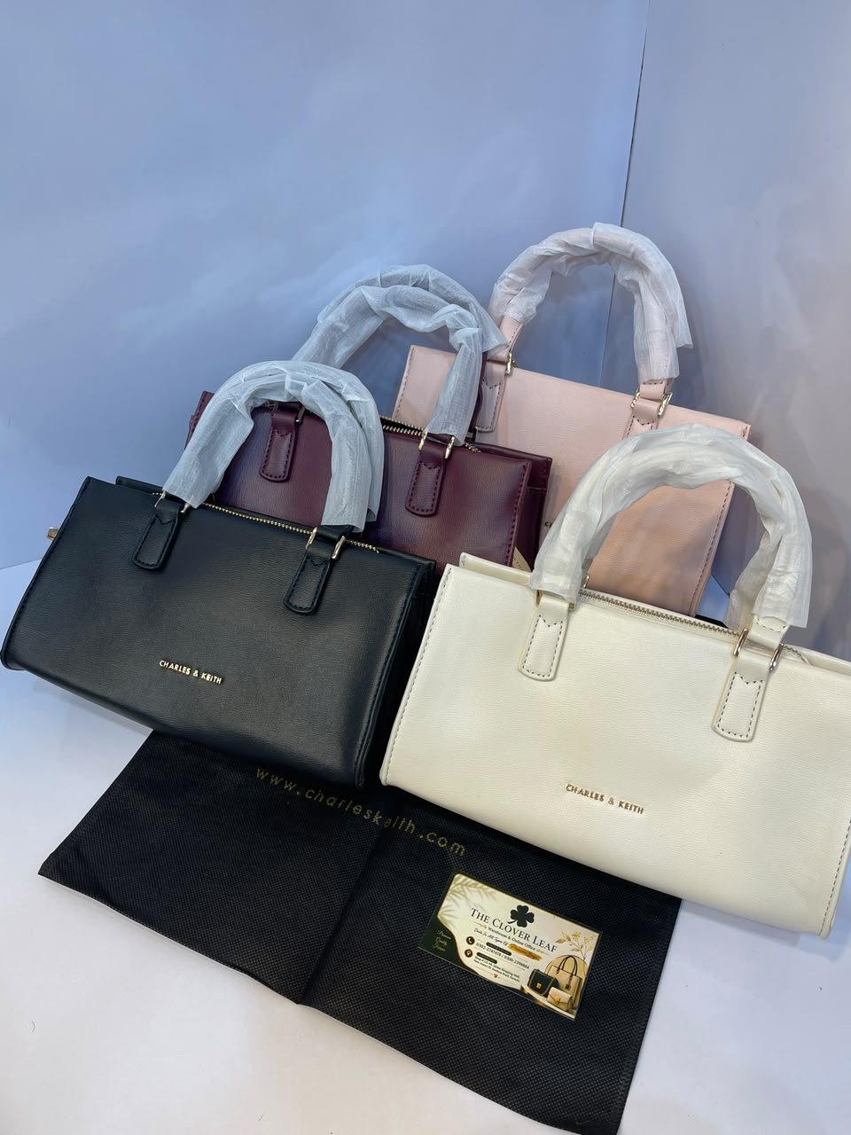 Charles & Keith Minimalist Matte Top-Handle Trapeze Bag – Premium Everyday Crossbody Satchel