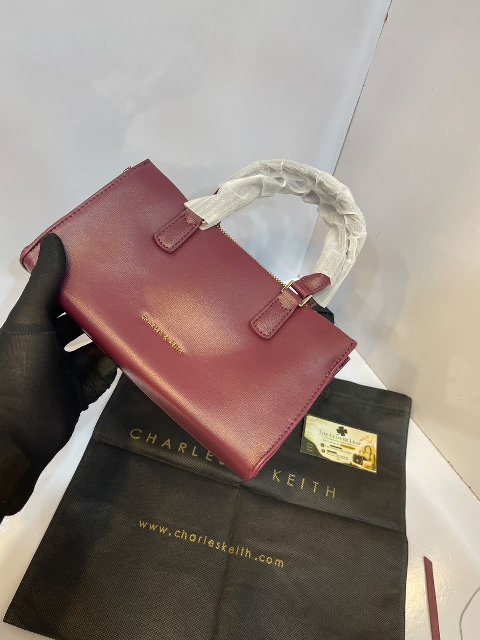 Charles & Keith Minimalist Matte Top-Handle Trapeze Bag – Premium Everyday Crossbody Satchel