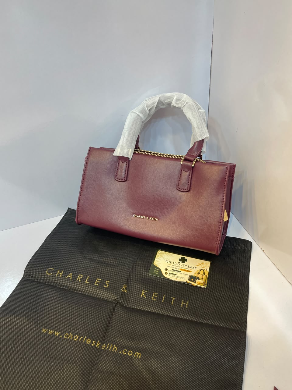 Charles & Keith Minimalist Matte Top-Handle Trapeze Bag – Premium Everyday Crossbody Satchel